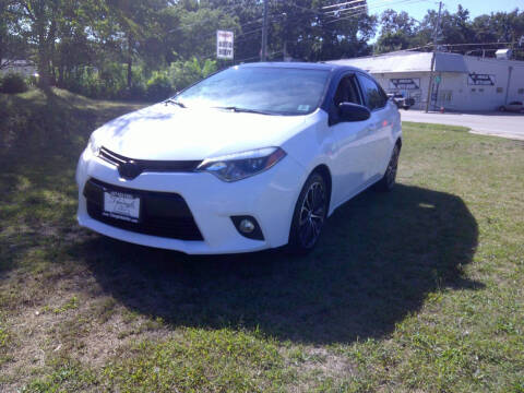 2016 Toyota Corolla for sale at Triangle Auto Sales in Elgin IL