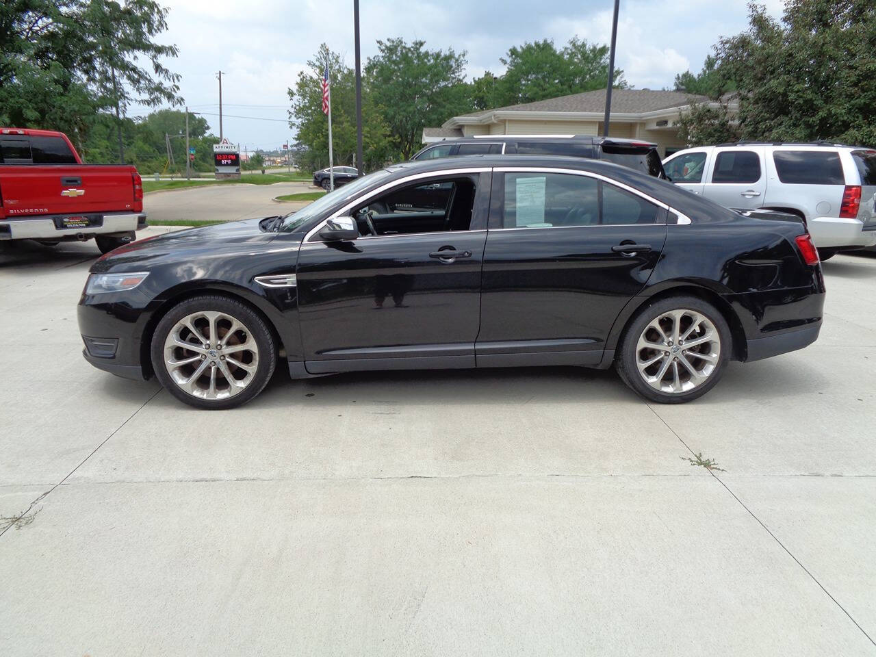 2014 Ford Taurus for sale at El Paso Auto Sale in Des Moines, IA