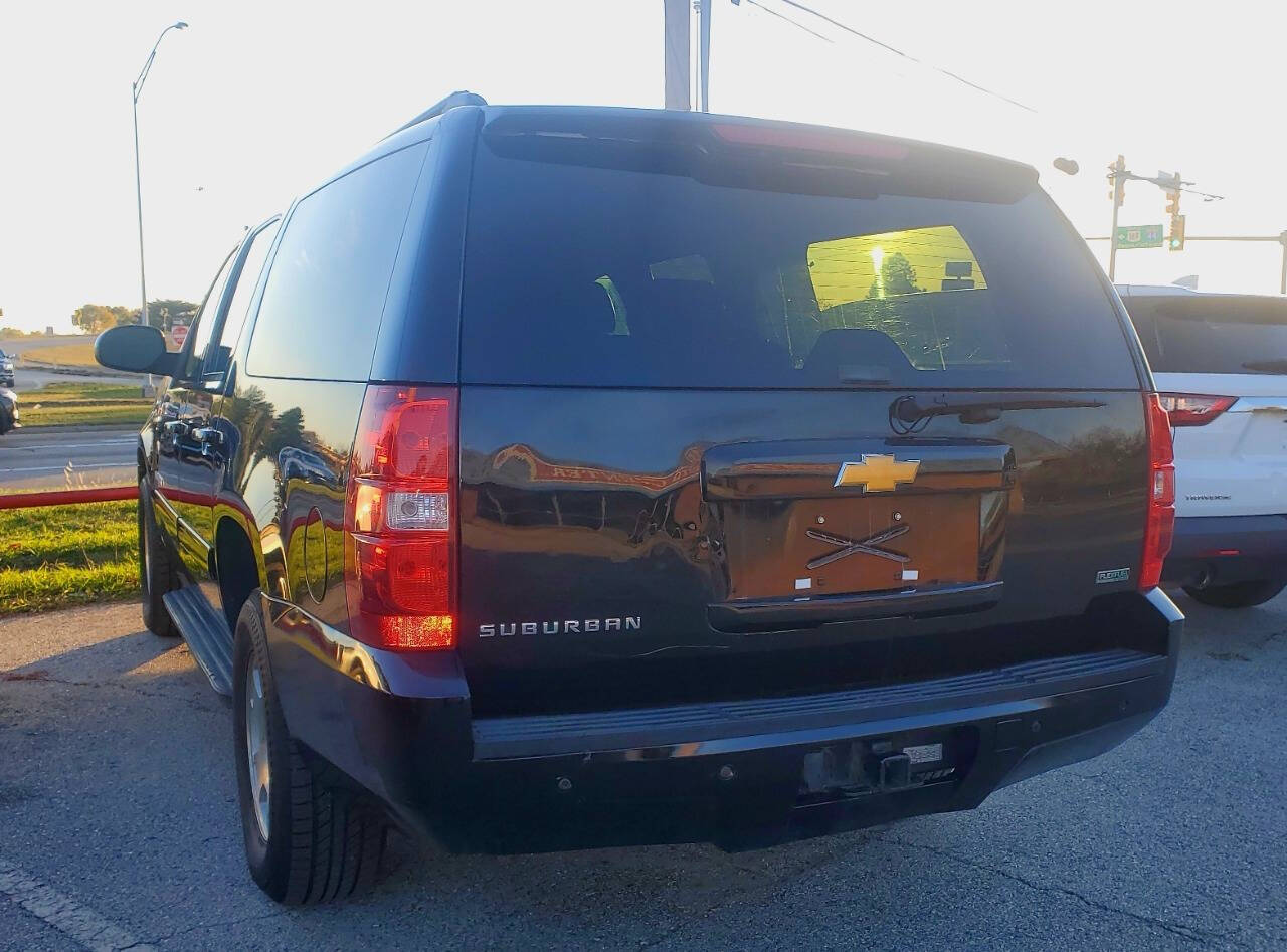 2012 Chevrolet Suburban for sale at DURANGO AUTO CENTER LLC in Tulsa, OK