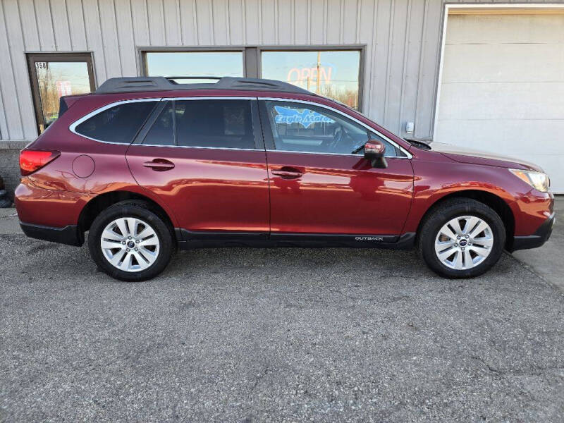 Used 2015 Subaru Outback Premium with VIN 4S4BSAHC3F3331102 for sale in La Crescent, Minnesota