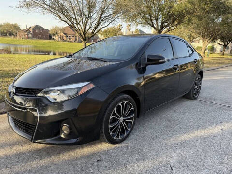 2014 Toyota Corolla for sale at Essence Autos in Spring TX