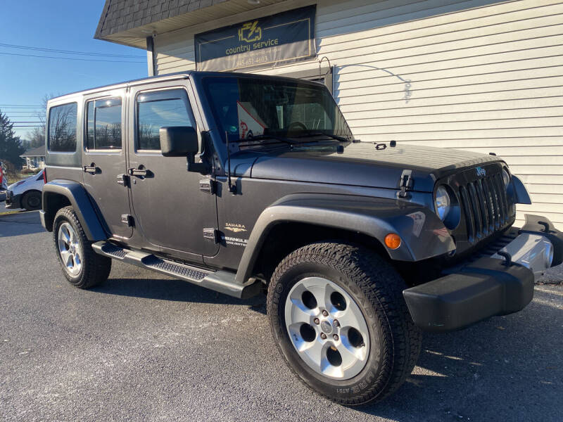 2014 Jeep Wrangler Unlimited for sale at COUNTRY SAAB OF ORANGE COUNTY in Florida NY