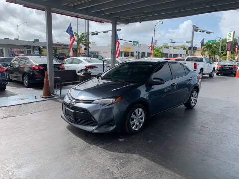 2019 Toyota Corolla for sale at American Auto Sales in Hialeah FL
