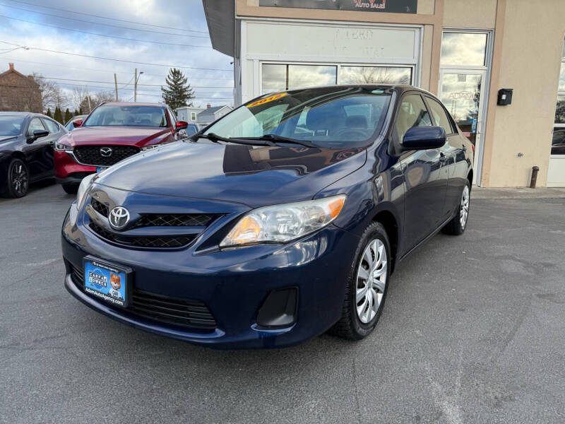 2012 Toyota Corolla for sale at ADAM AUTO AGENCY in Rensselaer NY