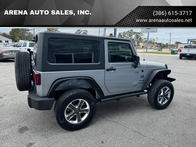 2014 Jeep Wrangler for sale at ARENA AUTO SALES,  INC. in Holly Hill FL