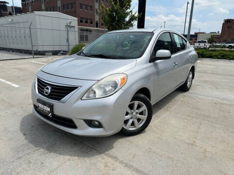 2013 Nissan Versa for sale at Freedom Motors in Lincoln NE