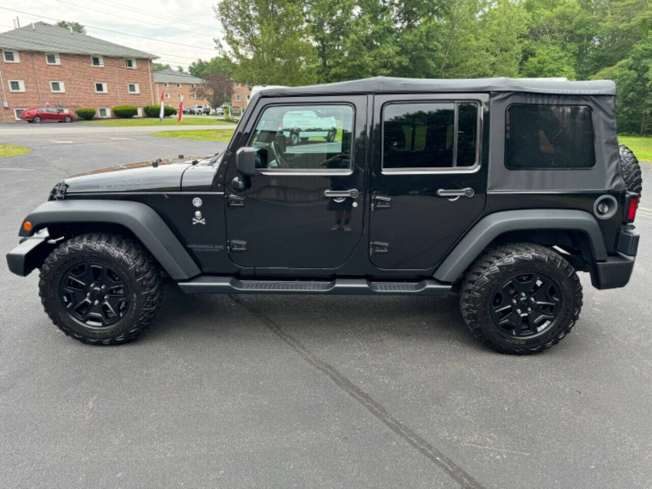 2016 Jeep Wrangler Unlimited for sale at BRW Motorsports LLC in Derry, NH