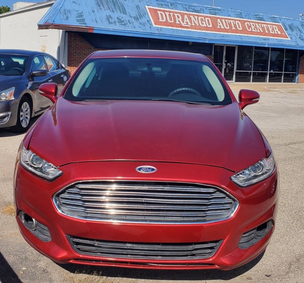 2015 Ford Fusion for sale at DURANGO AUTO CENTER LLC in Tulsa, OK