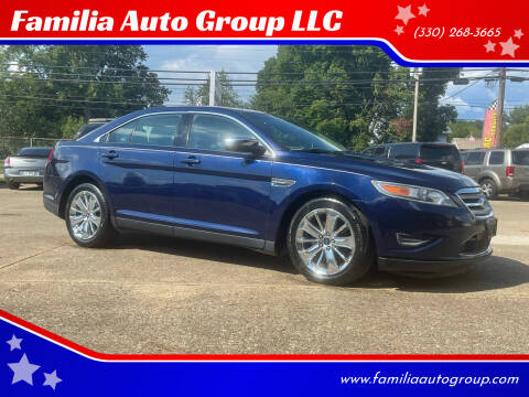 2011 Ford Taurus for sale at Familia Auto Group LLC in Massillon OH