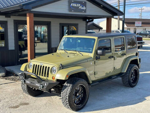 2013 Jeep Wrangler Unlimited for sale at Fesler Auto in Pendleton IN