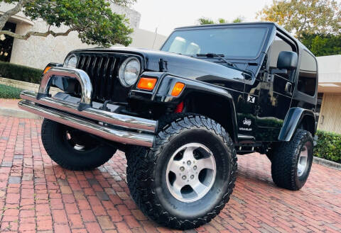 2003 Jeep Wrangler for sale at PennSpeed in New Smyrna Beach FL