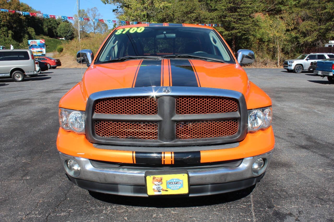 Orange 2003 Dodge Ram 1500 Laramie 4dr Laramie Quad Cab LB RWD 2