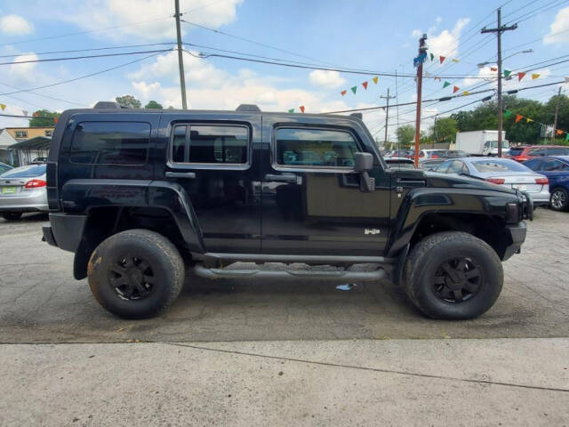 2007 HUMMER H3 for sale at DAGO'S AUTO SALES LLC in Dalton, GA