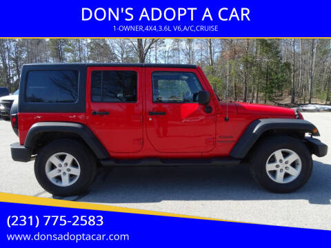 2015 Jeep Wrangler Unlimited for sale at DON'S ADOPT A CAR in Cadillac MI