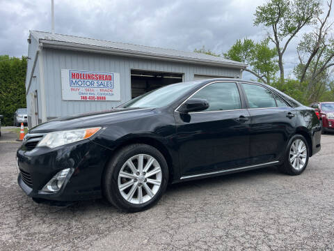 2014 Toyota Camry for sale at HOLLINGSHEAD MOTOR SALES in Cambridge OH