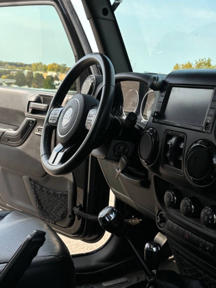 2015 Jeep Wrangler Unlimited for sale at GHOST AUTOWERKZ in Northbrook, IL