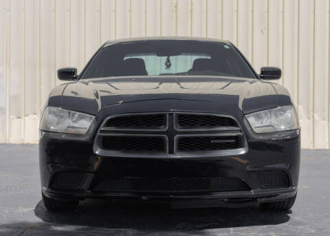 2012 Dodge Charger for sale at Auto Outlet of Sarasota in Sarasota FL