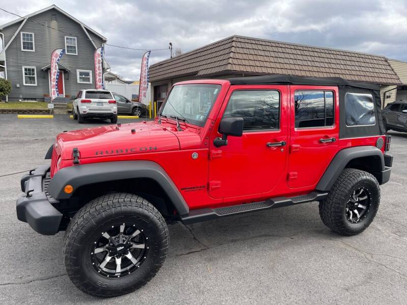 2015 Jeep Wrangler Unlimited for sale at MAGNUM MOTORS in Reedsville PA