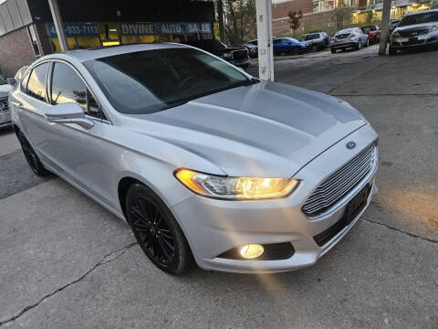 2016 Ford Fusion for sale at Divine Auto Sales LLC in Omaha NE