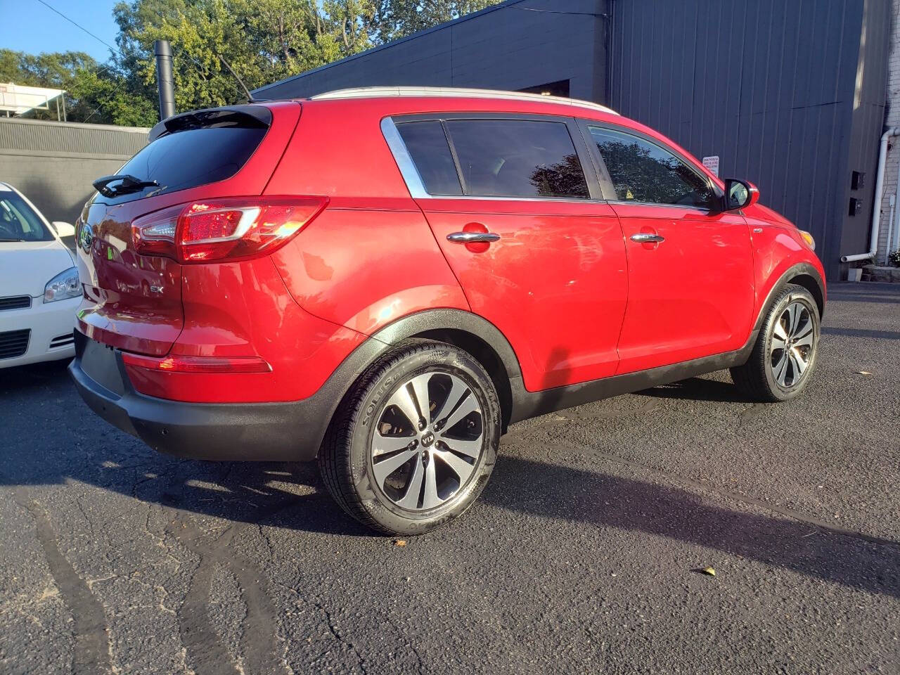 2013 Kia Sportage for sale at Auto Shop in Wyoming, MI