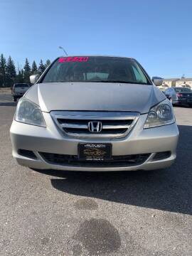2006 Honda Odyssey for sale at BELOW BOOK AUTO SALES in Idaho Falls ID