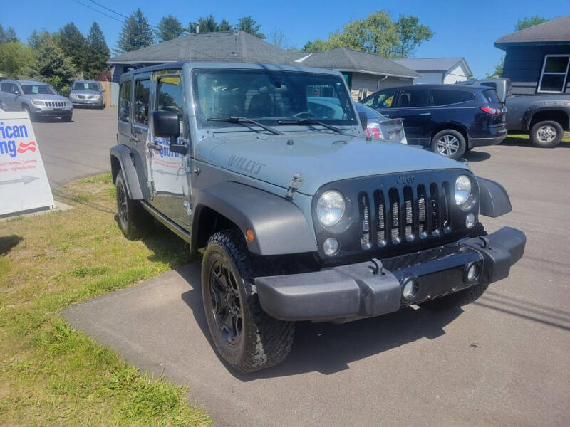 2014 Jeep Wrangler Unlimited for sale at MGM Auto Sales in Cortland NY