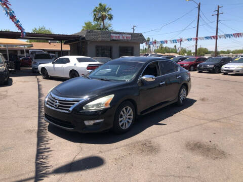 2014 Nissan Altima for sale at Valley Auto Center in Phoenix AZ