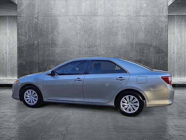 2014 Toyota Camry for sale at We Buy & Sell Cars Inc in Orlando, FL