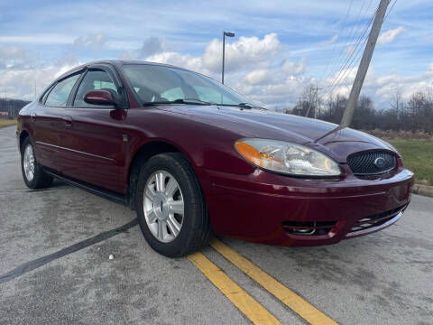 2005 Ford Taurus for sale at Jim's Hometown Auto Sales LLC in Cambridge OH