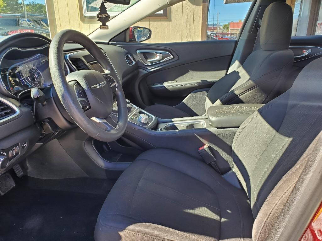 2015 Chrysler 200 for sale at DAGO'S AUTO SALES LLC in Dalton, GA