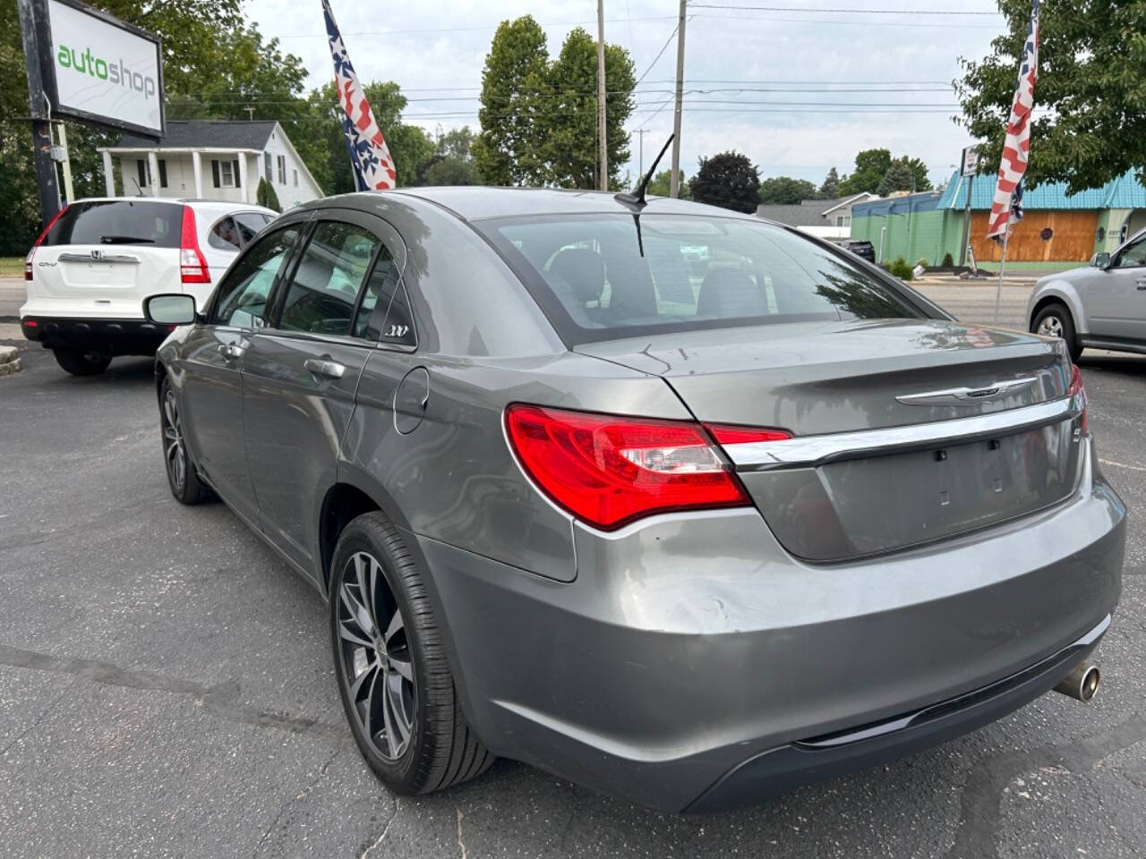 2013 Chrysler 200 for sale at Auto Shop in Wyoming, MI