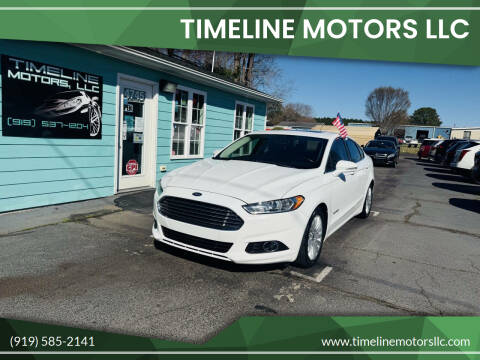2015 Ford Fusion Hybrid for sale at Timeline Motors LLC in Clayton NC