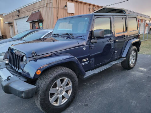 2013 Jeep Wrangler Unlimited for sale at Tumbleson Automotive in Kewanee IL