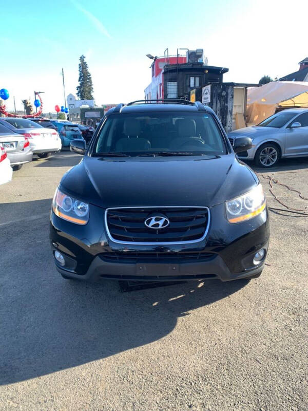 2011 Hyundai Santa Fe for sale at PRICELESS AUTO SALES LLC in Auburn WA