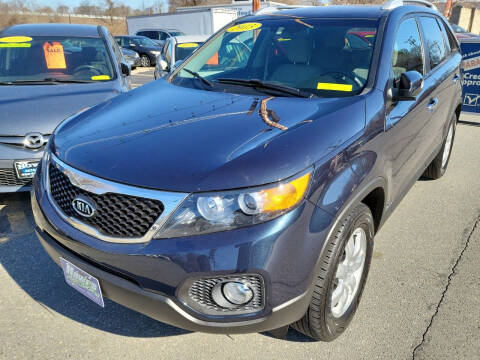2013 Kia Sorento for sale at Howe's Auto Sales in Lowell MA