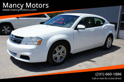 2011 Dodge Avenger for sale at Mancy Motors in Mancelona MI