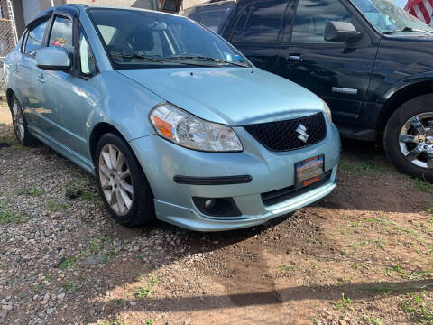 2009 Suzuki SX4 for sale at Zack & Auto Sales LLC in Staten Island NY