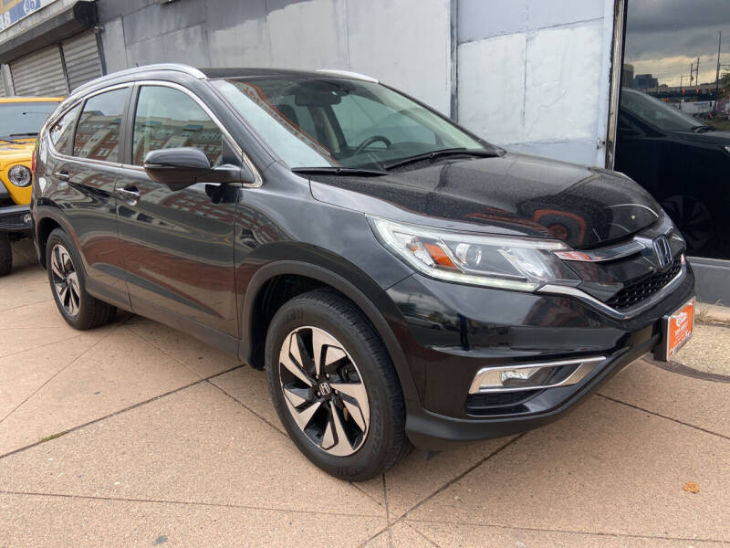 2015 Honda CR-V for sale at TOP SHELF AUTOMOTIVE in Newark NJ