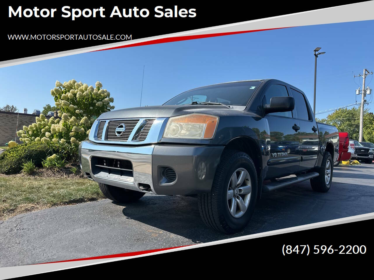 2009 Nissan Titan SE FFV 4x4 Crew Cab Short Bed 4dr's photo