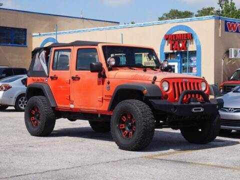 2013 Jeep Wrangler Unlimited for sale at Sunny Florida Cars in Bradenton FL