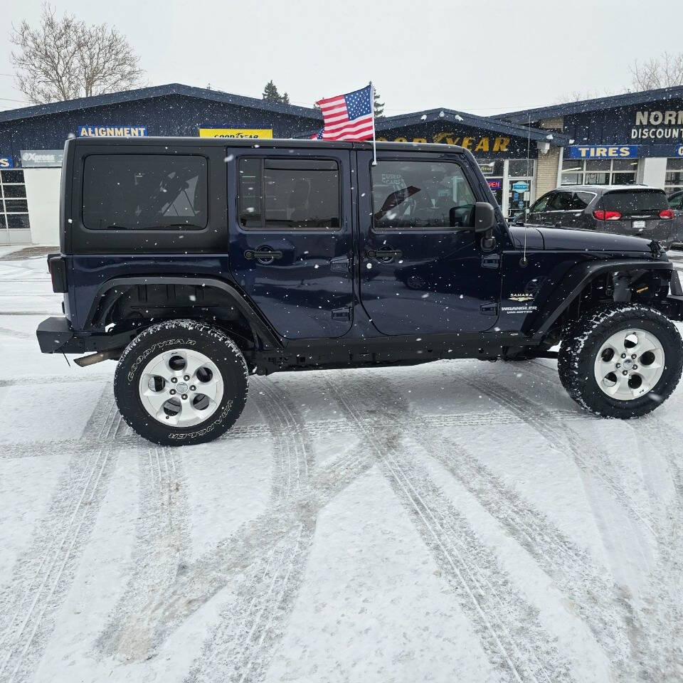 2013 Jeep Wrangler Unlimited for sale at Norman's Auto Sales in Cleveland, OH