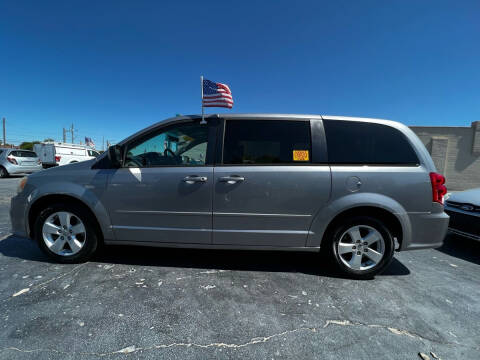 2013 Dodge Grand Caravan for sale at FAMILY AUTO CENTER in Greenville NC