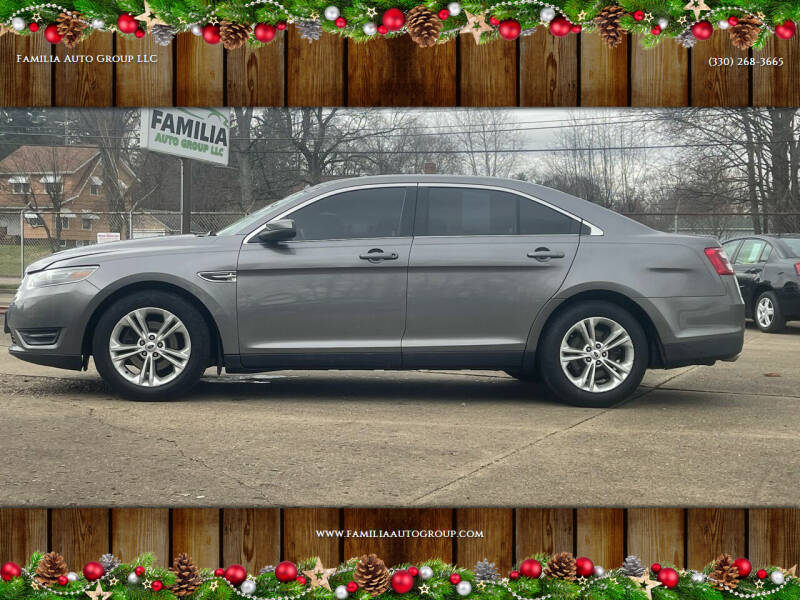 2013 Ford Taurus for sale at Familia Auto Group LLC in Massillon OH
