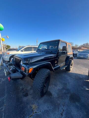1997 Jeep Wrangler for sale at Gator's Auto Sales in Garland TX