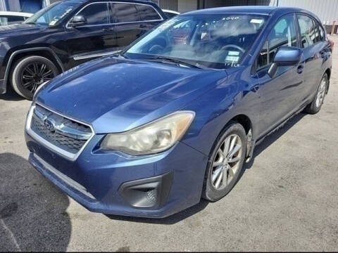 2012 Subaru Impreza for sale at FREDYS CARS FOR LESS in Houston TX