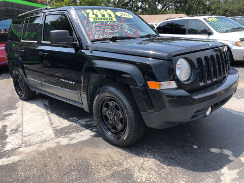 2014 Jeep Patriot for sale at RIVERSIDE MOTORCARS INC - Main Lot in New Smyrna Beach FL