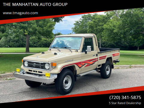1997 Toyota FZJ75 Land Cruiser for sale at THE MANHATTAN AUTO GROUP in Lakewood CO