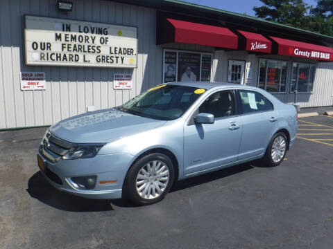 2011 Ford Fusion Hybrid for sale at GRESTY AUTO SALES in Loves Park IL