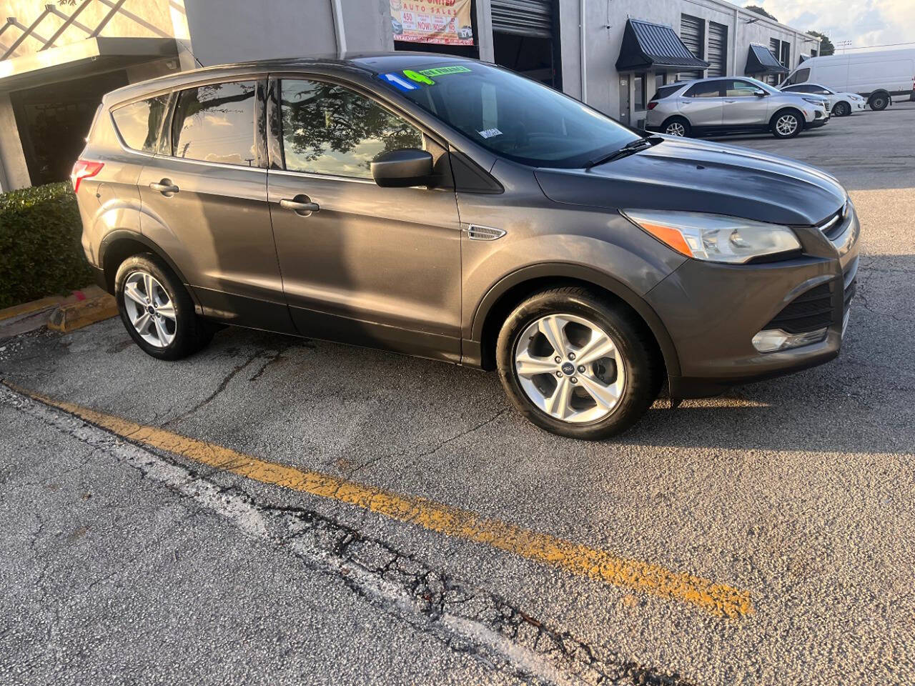 2014 Ford Escape for sale at M & J UNITED AUTO SALES in LAUDERDALE LAKES, FL