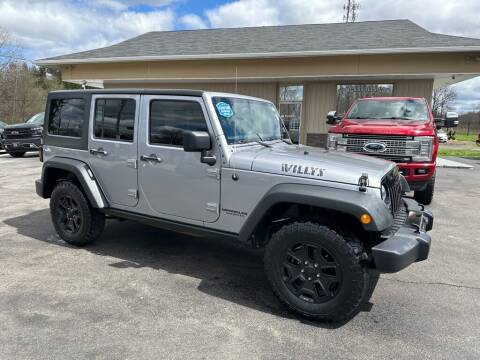 2017 Jeep Wrangler Unlimited for sale at RPM Auto Sales in Mogadore OH